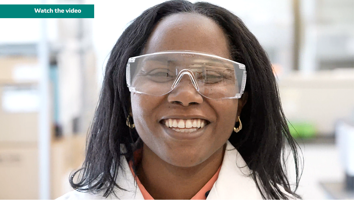 ww5 scientist Denarra Simmons wearing goggles and lab coat