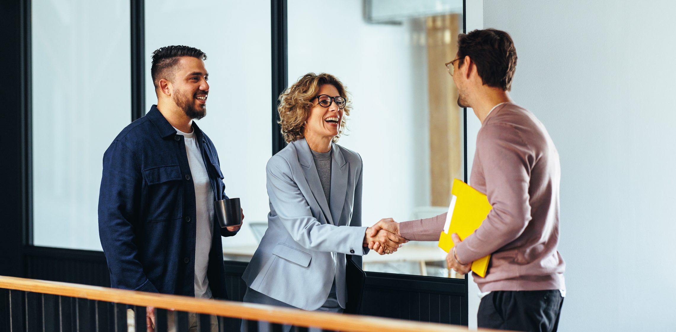 man and woman shaking hands