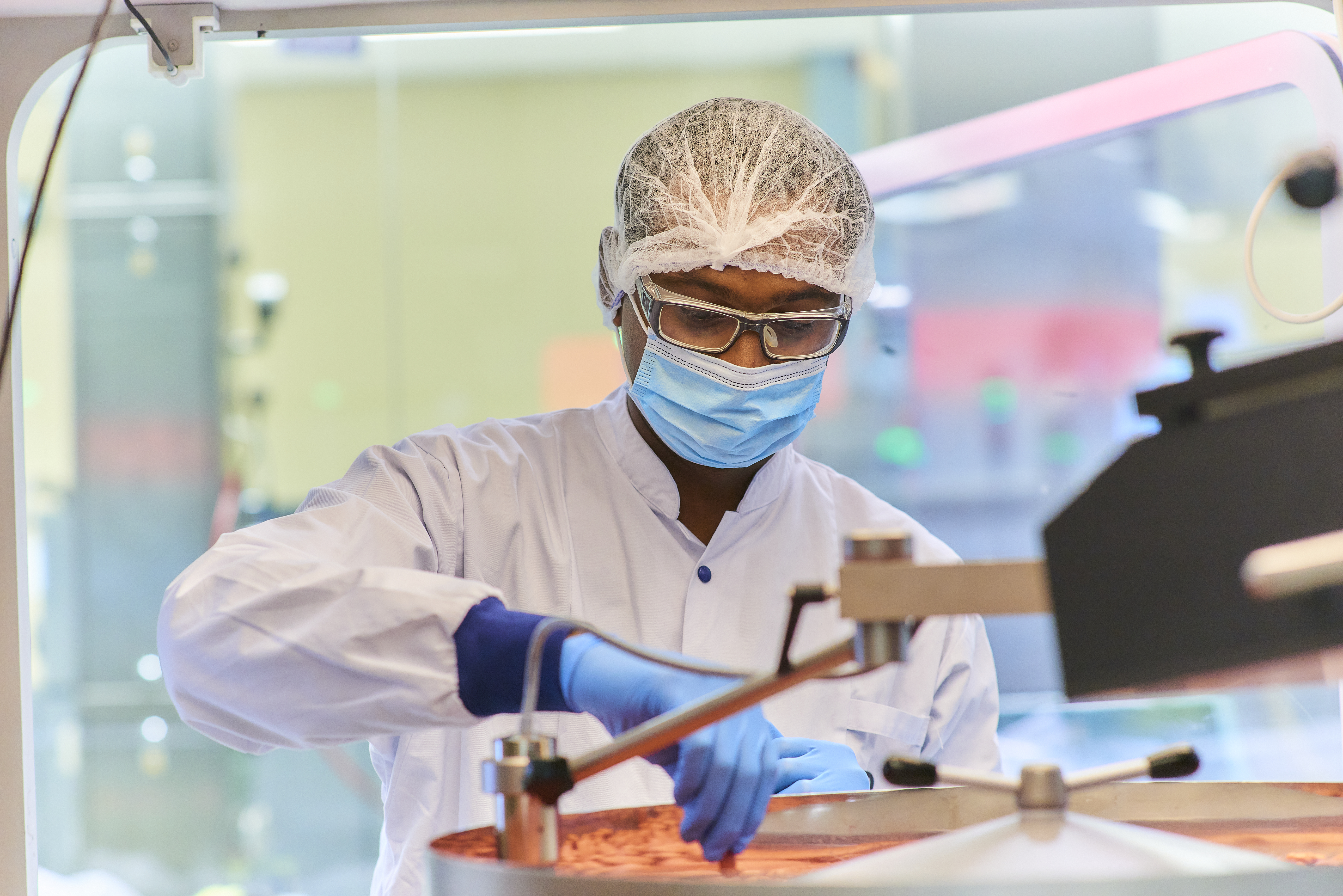 scientist wearing protective gear in lab