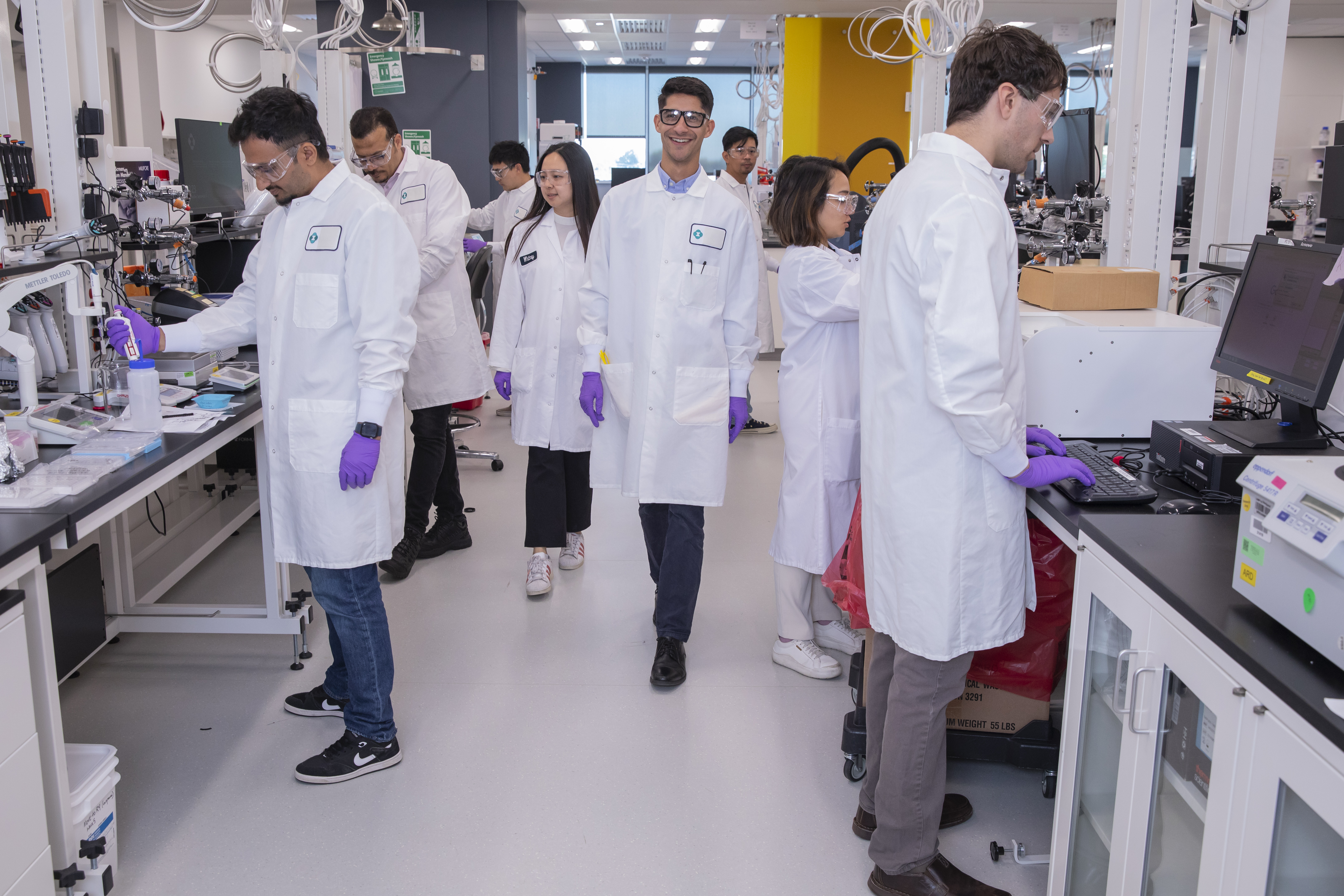 Photo of a number of scientists in a lab